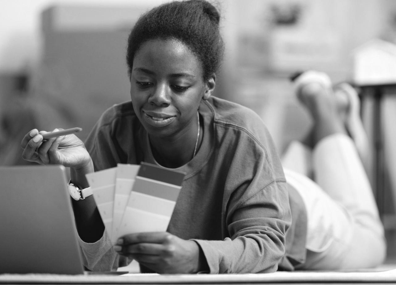 Strategic copywriting workflow showing research notes, customer interviews, and draft revisions spread across a workspace